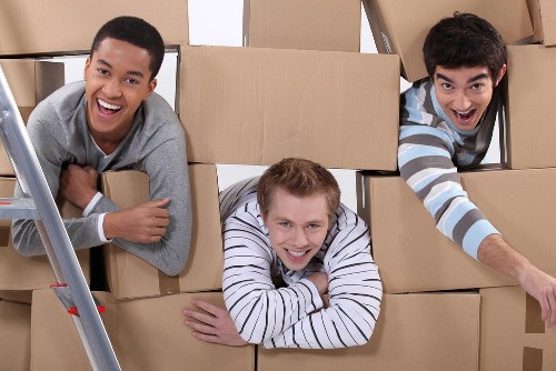 Packed boxes and furniture ready for a house move