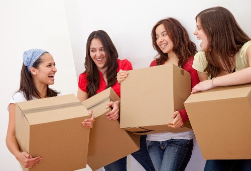 Packed moving boxes and furniture ready for house removals in Crystal Palace