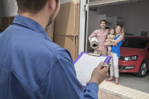 Removal team using protective moving equipment during a safe relocation