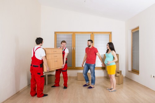 Office relocation in progress with organized equipment transport