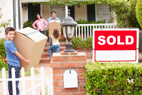 Trained movers handling boxes carefully as part of a professional move